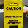 Caution Overstimulated Desk Sign