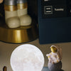 Original Sitting Astronaut & Moon Lamp™